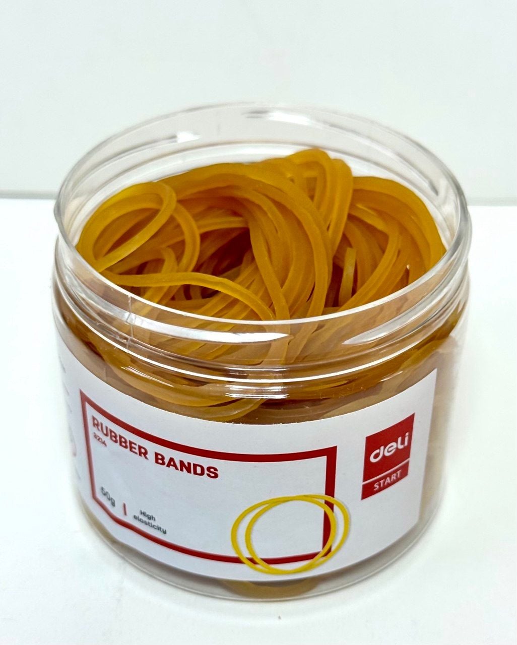 Гумка банківська для купюр 50 г жовта d 40 мм E3214 Deli